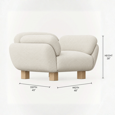 The Kara Lounge Chair by Kar Duran features a broad rounded seat, integrated arms, and continuous Alpine White upholstery for ACERKA Miami.
