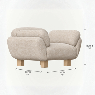 The Kara Lounge Chair by Kar Duran features a broad rounded seat, integrated arms, and continuous Stone Beige upholstery for ACERKA Miami.
