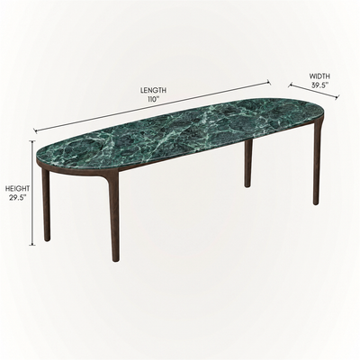 With its elongated stone surface and clean four-leg silhouette, ACERKA Miami’s Tcha Dining Table pairs expressive Verde Alpi marble with rich Dark Oak.
