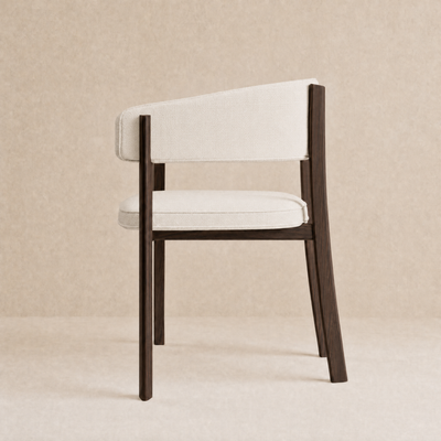 A modern accent chair with a dark brown wooden frame and off-white upholstered seat and backrest, shown against a neutral beige textured background.