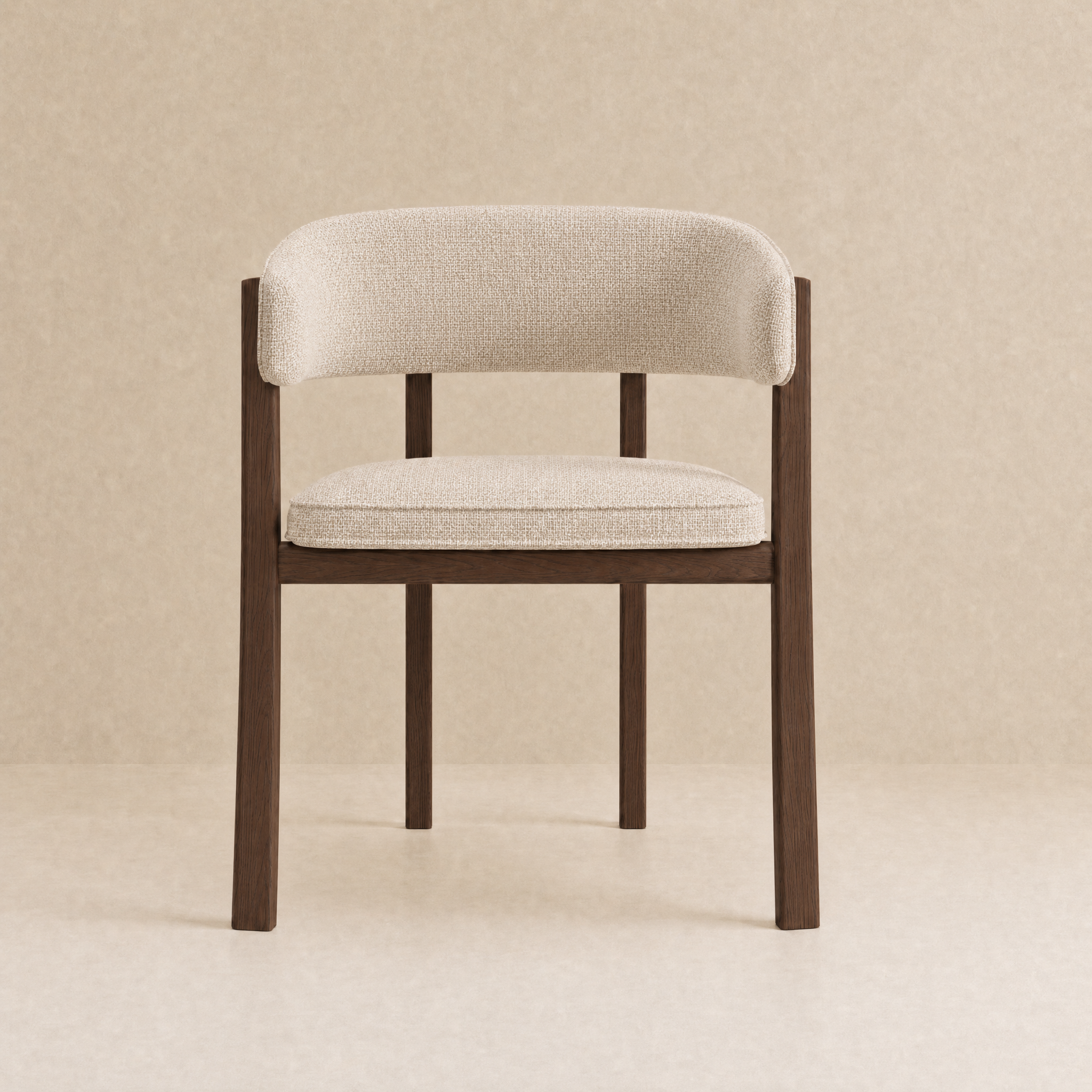 A modern dining chair with a curved upholstered backrest and seat cushion in a light beige textured fabric, supported by a dark brown wooden frame, set against a warm beige textured background.