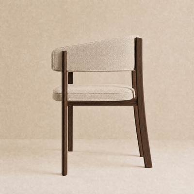 A modern dining chair with a dark brown wooden frame and textured light beige fabric upholstery on the seat and curved backrest, shown against a neutral beige textured background.